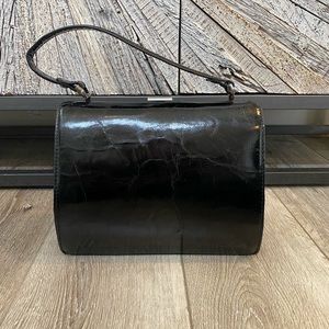 Black leather Patricia Nash Clutch